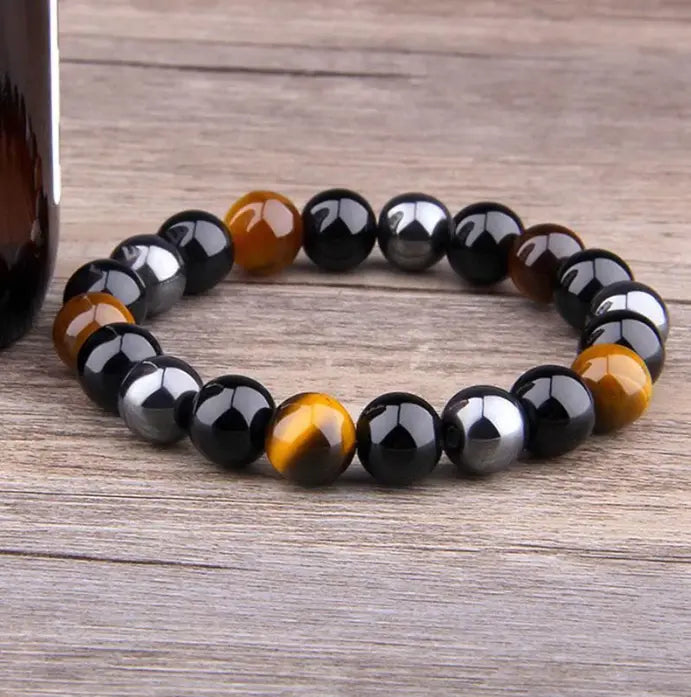 Buddha Padmasana Triple Protection Bracelet - Tiger’s Eye, Obsidian, Hematite Buddha padmasana