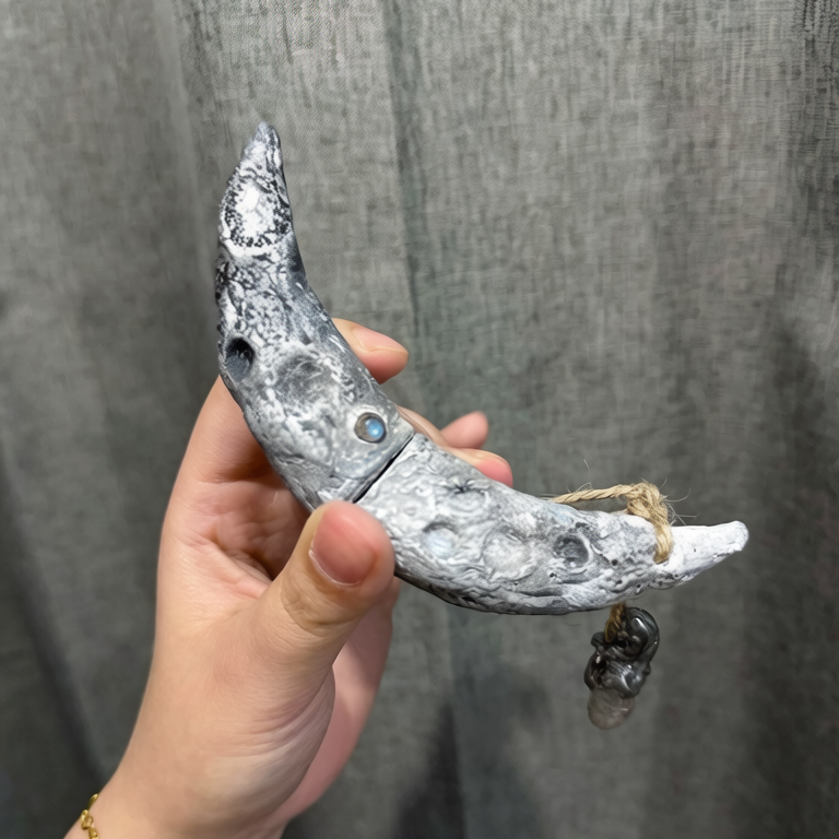 Handcrafted Crescent Moon Witchblade Pendant in Silver. Features realistic lunar crater texture, embedded Labradorite & Moonstone, and a Quartz charm. Durable, waterproof statement jewelry for Wiccan rituals.