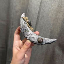 Load image into Gallery viewer, Handcrafted Crescent Moon Witchblade Pendant in Silver. Features realistic lunar crater texture, embedded Labradorite &amp; Moonstone, and a Quartz charm. Durable, waterproof statement jewelry for Wiccan rituals.